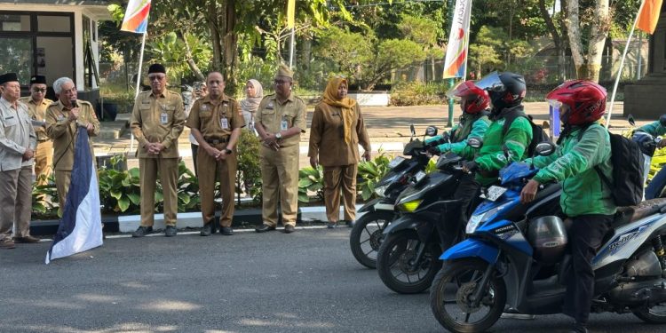 Ojek Online Keliling Distribusikan Uang Baznas Wonosobo