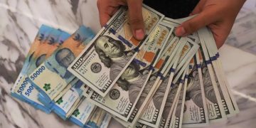 Tertekan Pasar Asia, Nilai Tukar Rupiah Tergerus ke Rp17.694 per Dolar AS